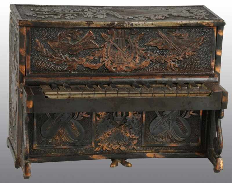 Appraisal: Cast Iron Piano Still Bank Description Manufactured by Roche Novelty