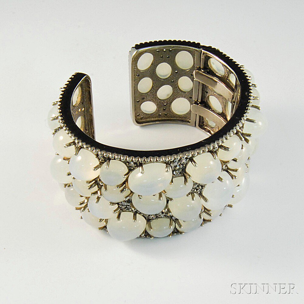 Appraisal: Oversized Sterling Silver and Moonstone Cuff with hinged portion to