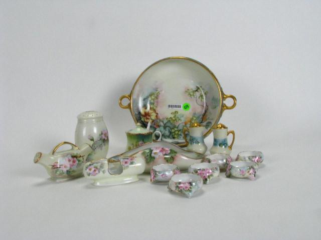 Appraisal: Group of hand-painted porcelain accessories including gold-enhanced handled grape motif