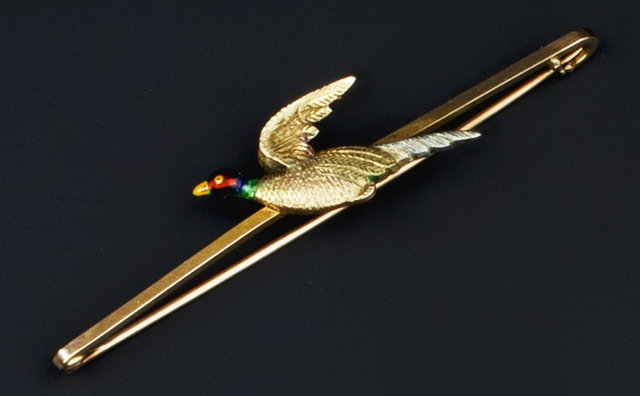 Appraisal: AN ENAMEL PHEASANT BAR BROOCH the uniform bar applied with