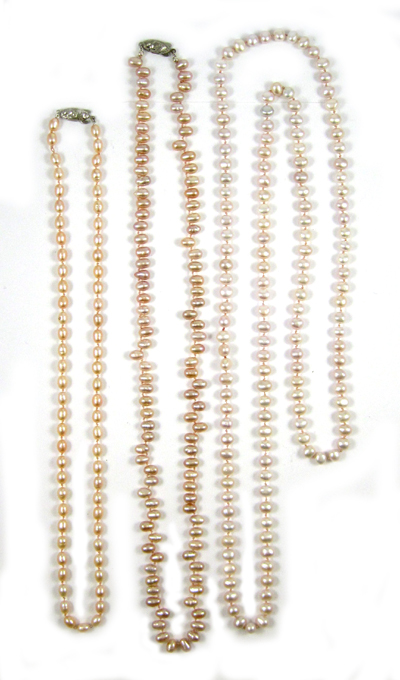 Appraisal: THREE PINK PEARL NECKLACES including a inch necklace strung with