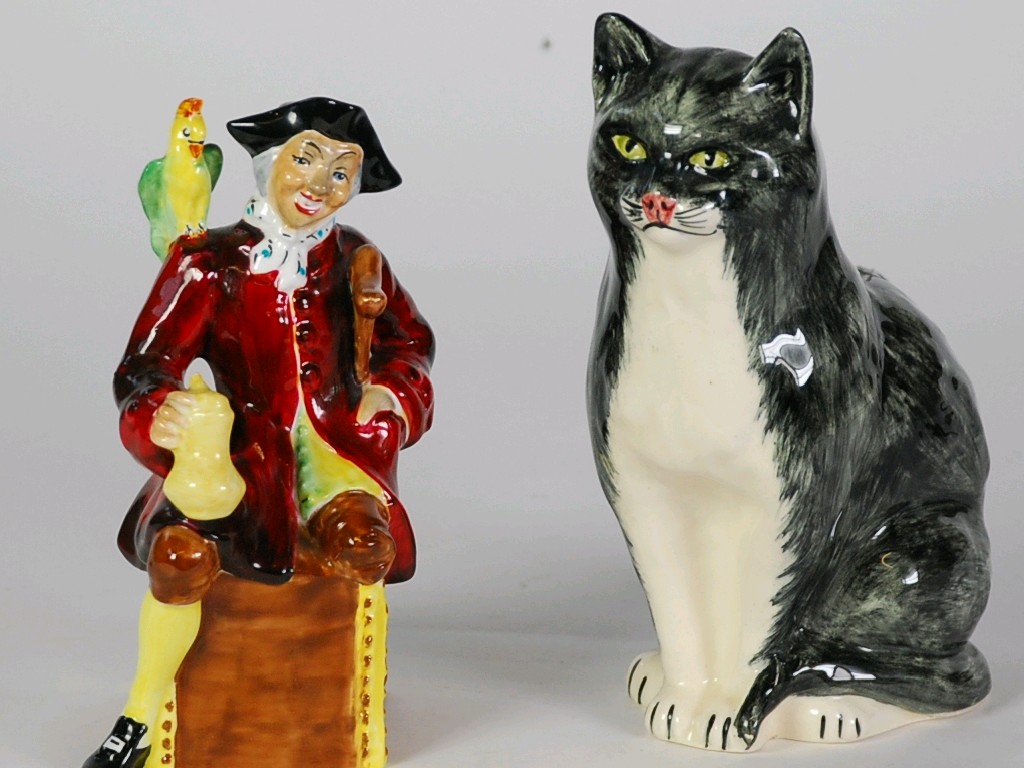 Appraisal: STAFFORDSHIRE BONE CHINA FIGURE OF ARTHUR BOWERS and a TOM