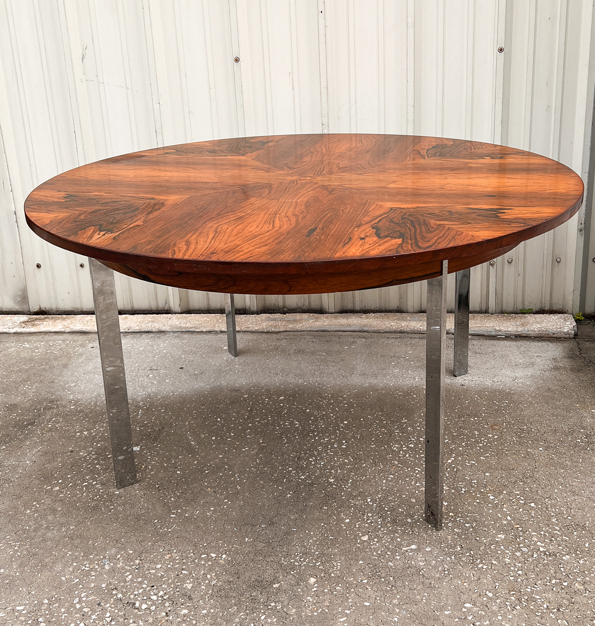 Appraisal: MID-CENTURY MODERN ROSEWOOD DINING TABLE Book matched Rosewood dining table