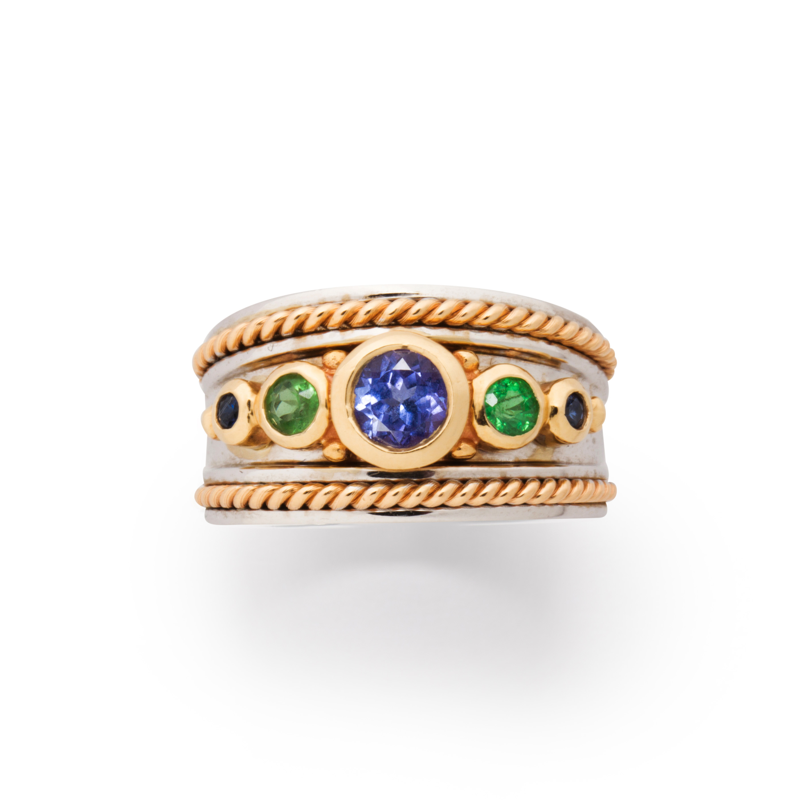 Appraisal: A GEMSTONE AND FOURTEEN KARAT WHITE BI-COLOR GOLD RING A