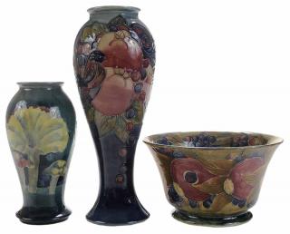 Appraisal: Three Moorcroft Pottery Articles Burslem England decorated with pomegranates and