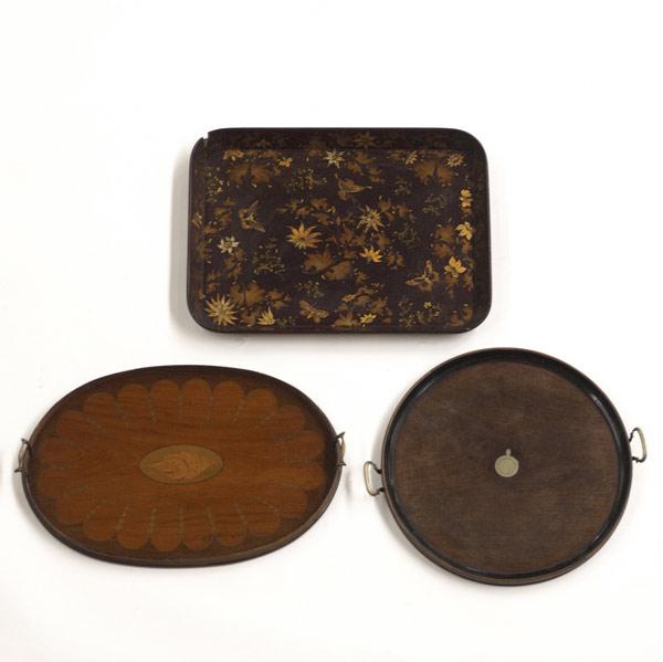 Appraisal: SERVING TRAYS Grouping of three include oval handled with shell