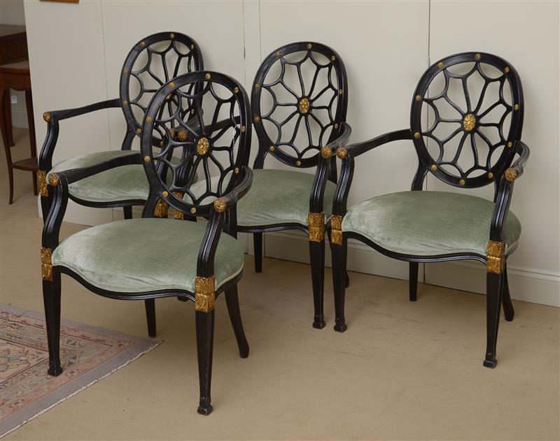 Appraisal: Set of Four George III Style Black-Painted and Parcel-Gilt Wheel-Back