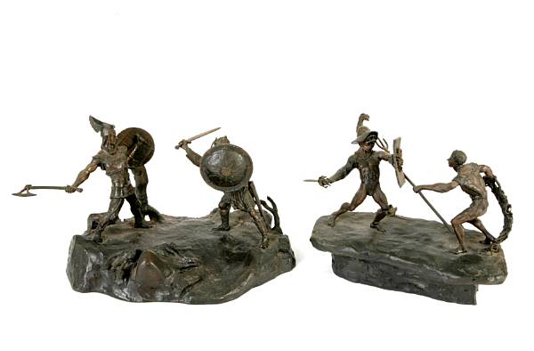 Appraisal: A group of three patinated bronze figural groups height of