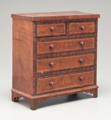 Appraisal: Inlaid miniature chest bookmatched veneers two-over-three graduated dovetailed drawers with