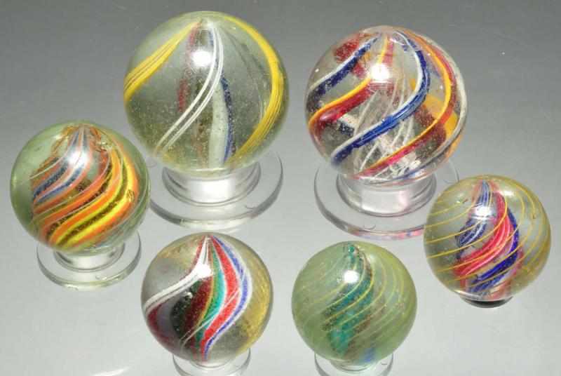 Appraisal: Lot of Swirl Marbles Description Includes one latticino four divided