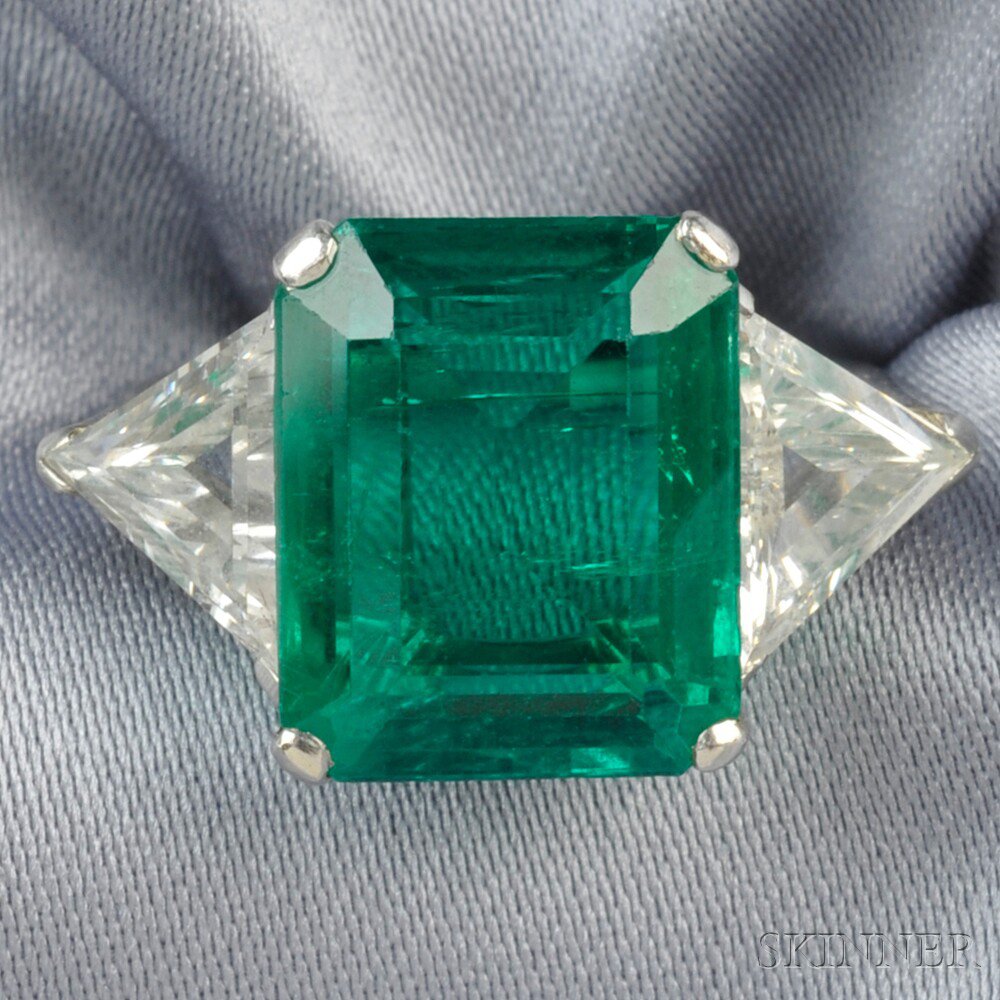 Appraisal: Emerald and Diamond Ring set with an emerald-cut emerald measuring