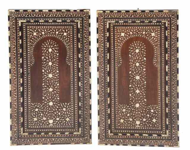 Appraisal: A PAIR OF HOSHIARPUR PANELS with trailing bone ivory foliate