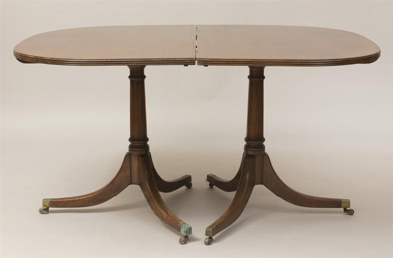 Appraisal: George III Style Mahogany Two-Pedestal Dining Table With an extra