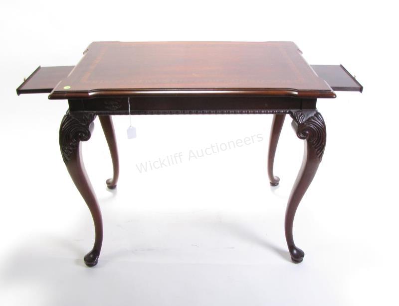 Appraisal: A Chippendale period style mahogany end table with banded mahogany