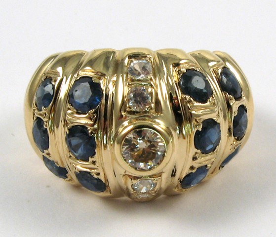 Appraisal: SAPPHIRE DIAMOND AND YELLOW GOLD RING The k gold band