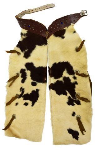 Appraisal: Vintage cowhide and leather cowboy chaps with concho accents likely