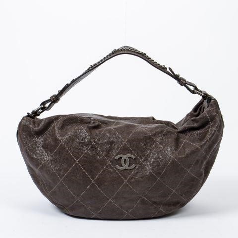 Appraisal: Chanel hobo shoulder bag in large brown quilted leather gunmetal-tone