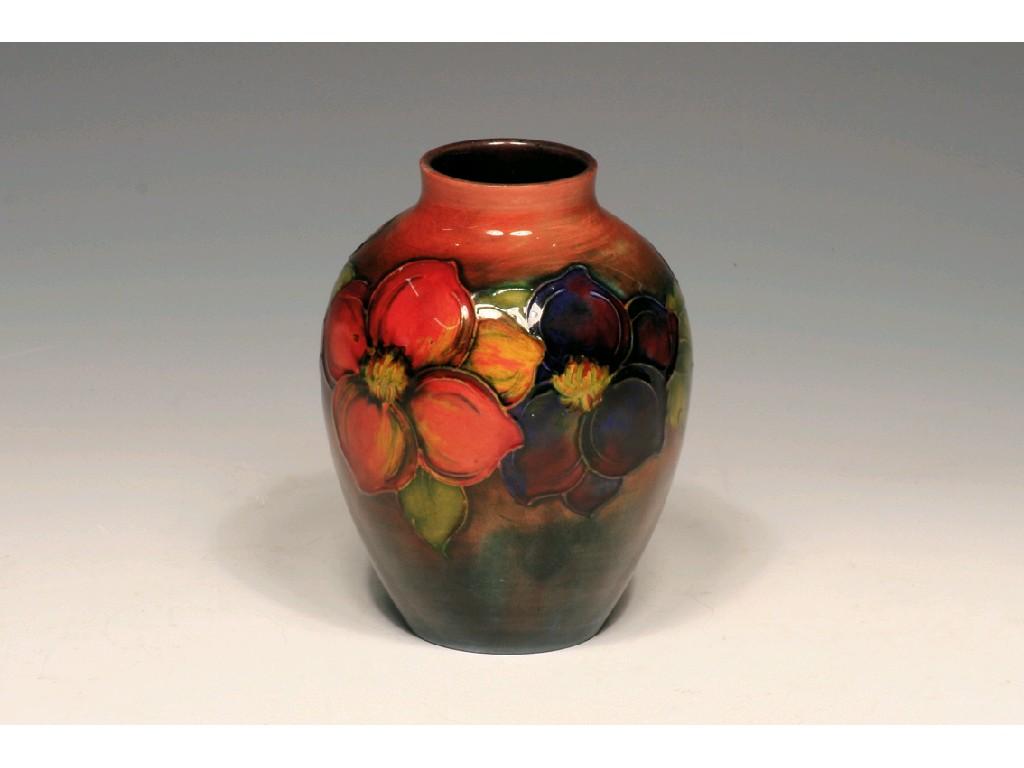 Appraisal: A SMALL MOORCROFT VASE of ovoid form decorated with flowers