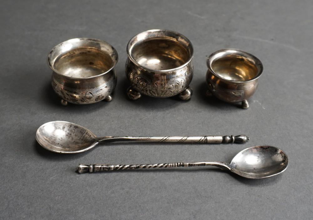 Appraisal: THREE RUSSIAN -SILVER FOOTED SALTS AND TWO NIELLO DECORATED SPOONS