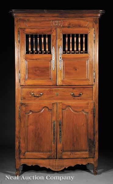 Appraisal: A Louis XV Carved Fruitwood Buffet the upper case with