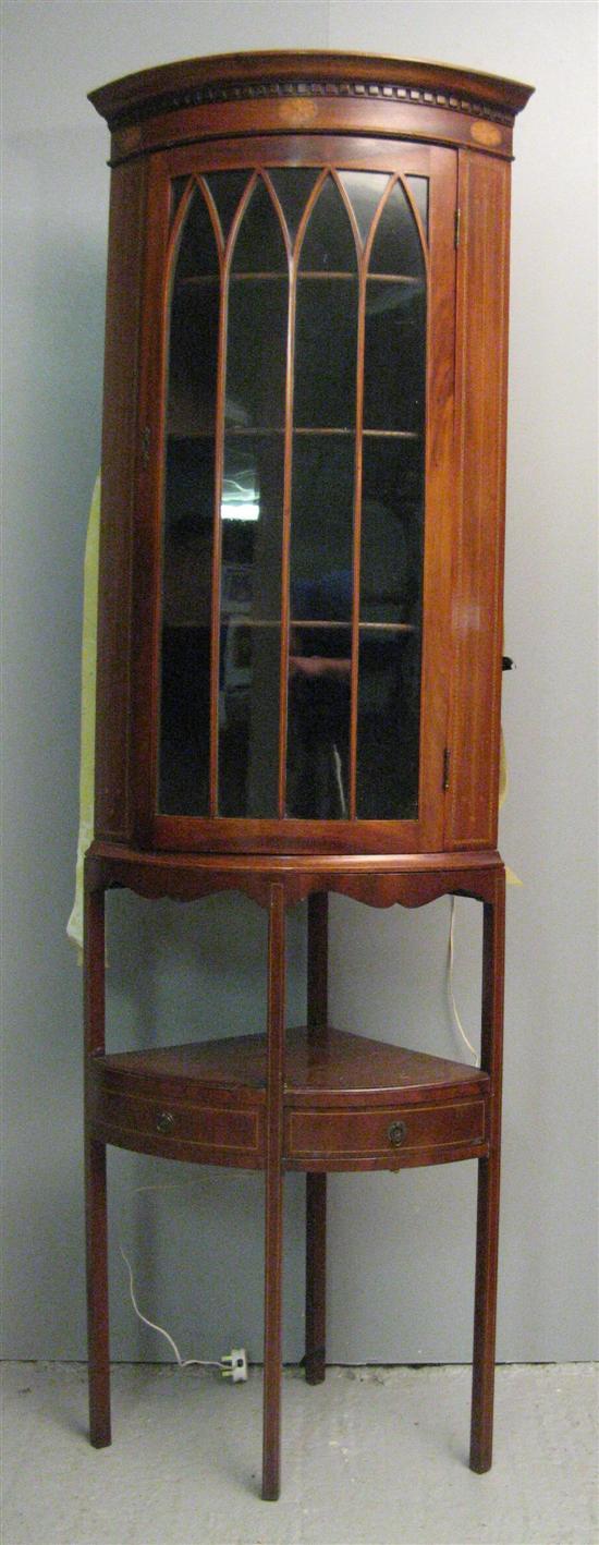 Appraisal: th century mahogany and inlaid standing corner cupboard with a