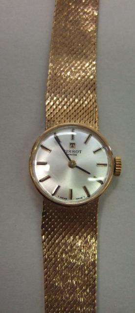 Appraisal: A ladies ct gold Tissot bracelet wristwatch the signed circular