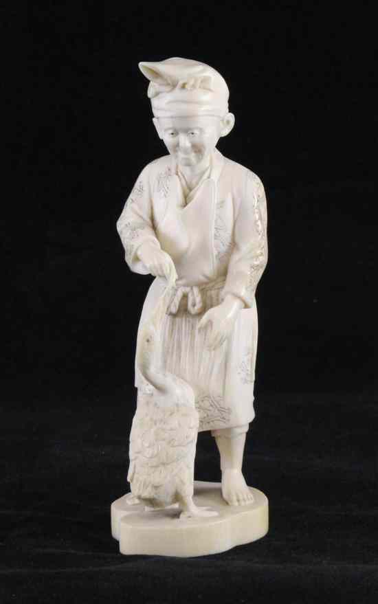 Appraisal: A Japanese ivory group early th century modelled as a