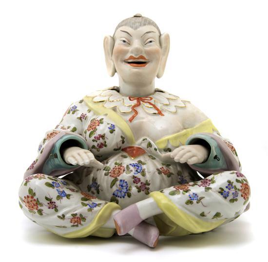 Appraisal: Dresden Porcelain Nodder Figure After the Meissen Model the seated