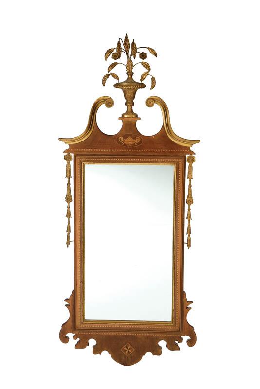 Appraisal: CHIPPENDALE-STYLE PARCEL-GILT MIRROR European early-mid th century mahogany Of typical