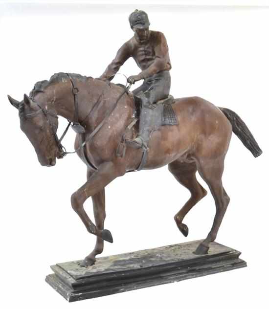 Appraisal: SPELTER EQUESTRIAN FIGURE GROUP cast as a jockey and mount