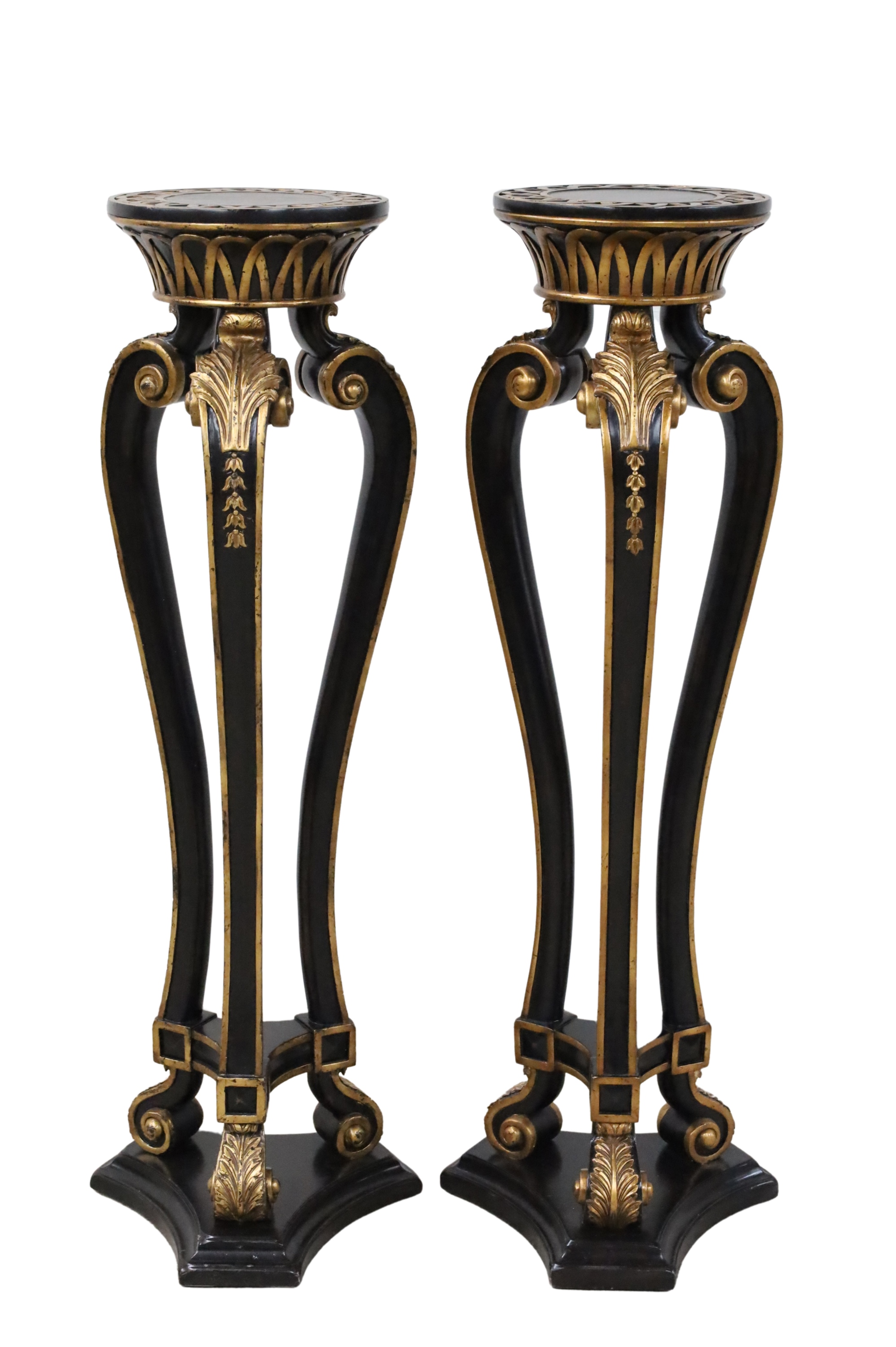 Appraisal: Decorative pair of carved ebony finished and gold gilt wood