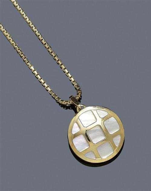 Appraisal: MOTHER-OF-PEARL AND GOLD PENDANT WITH CHAIN CARTIER PASHA Yellow gold