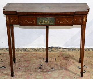 Appraisal: Edwardian partial painted satinwood flip-top games table having a shaped