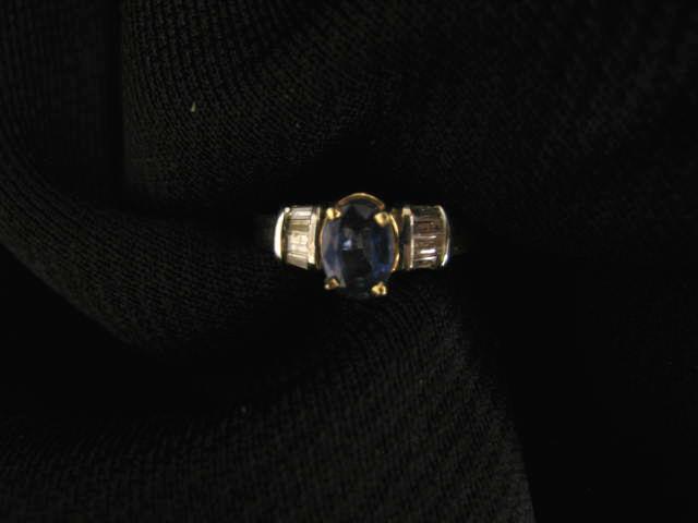 Appraisal: Sapphire Diamond Ring carat oval gem with baguette diamonds on