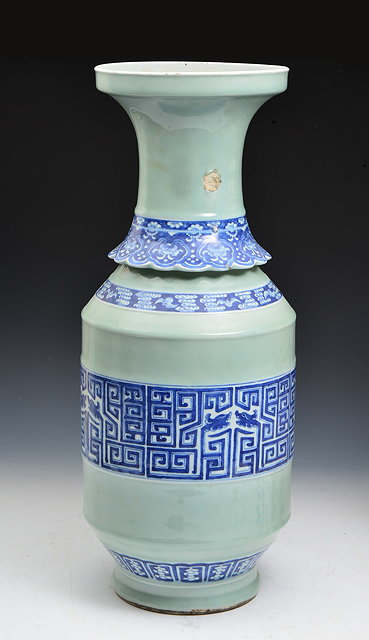 Appraisal: A Chinese celadon ground tall vase th Centurywith bands of