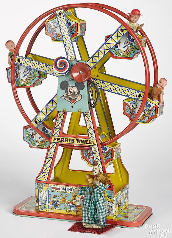 Appraisal: Chein Tin wind-up Mickey Mouse ferris wheel Chein tin lithograph