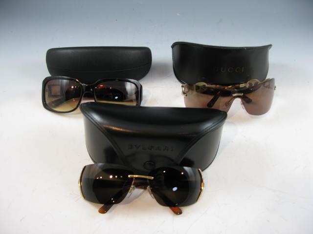 Appraisal: Three Designer Woman's Sunglasses one by Gucci one by Bulgari