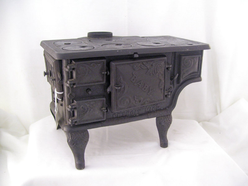 Appraisal: Cast Iron Baby Stove Child's cast iron play stove Has