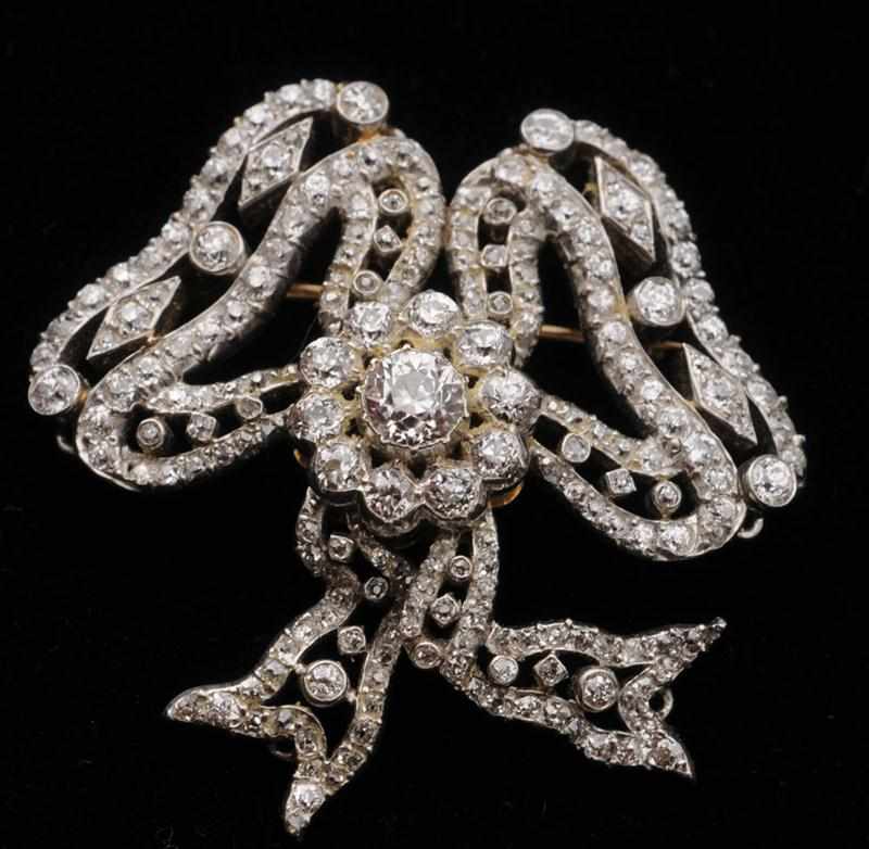 Appraisal: BELLE EPOQUE PLATINUM GOLD AND DIAMOND BOW BROOCH x in