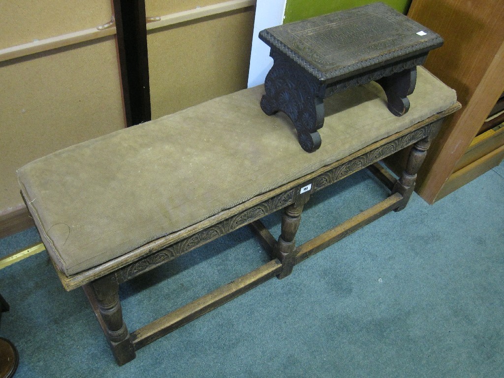 Appraisal: Lot comprising carved oak window seat and a footstool