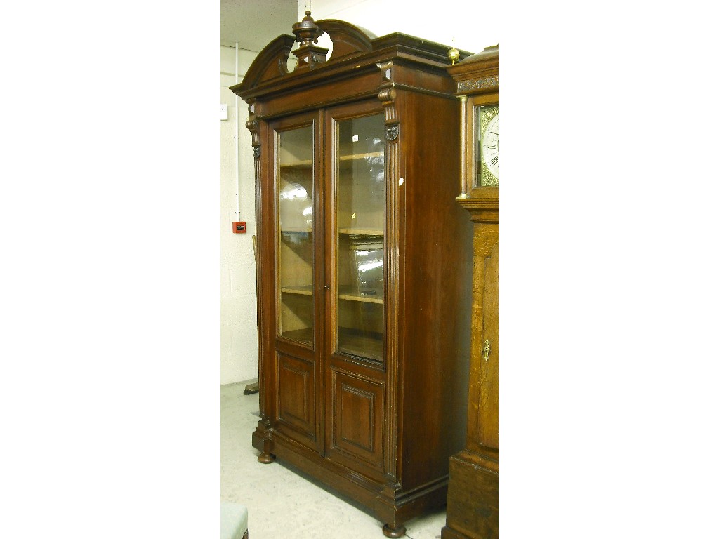 Appraisal: French display cabinet of architectural form with two glazed panelled