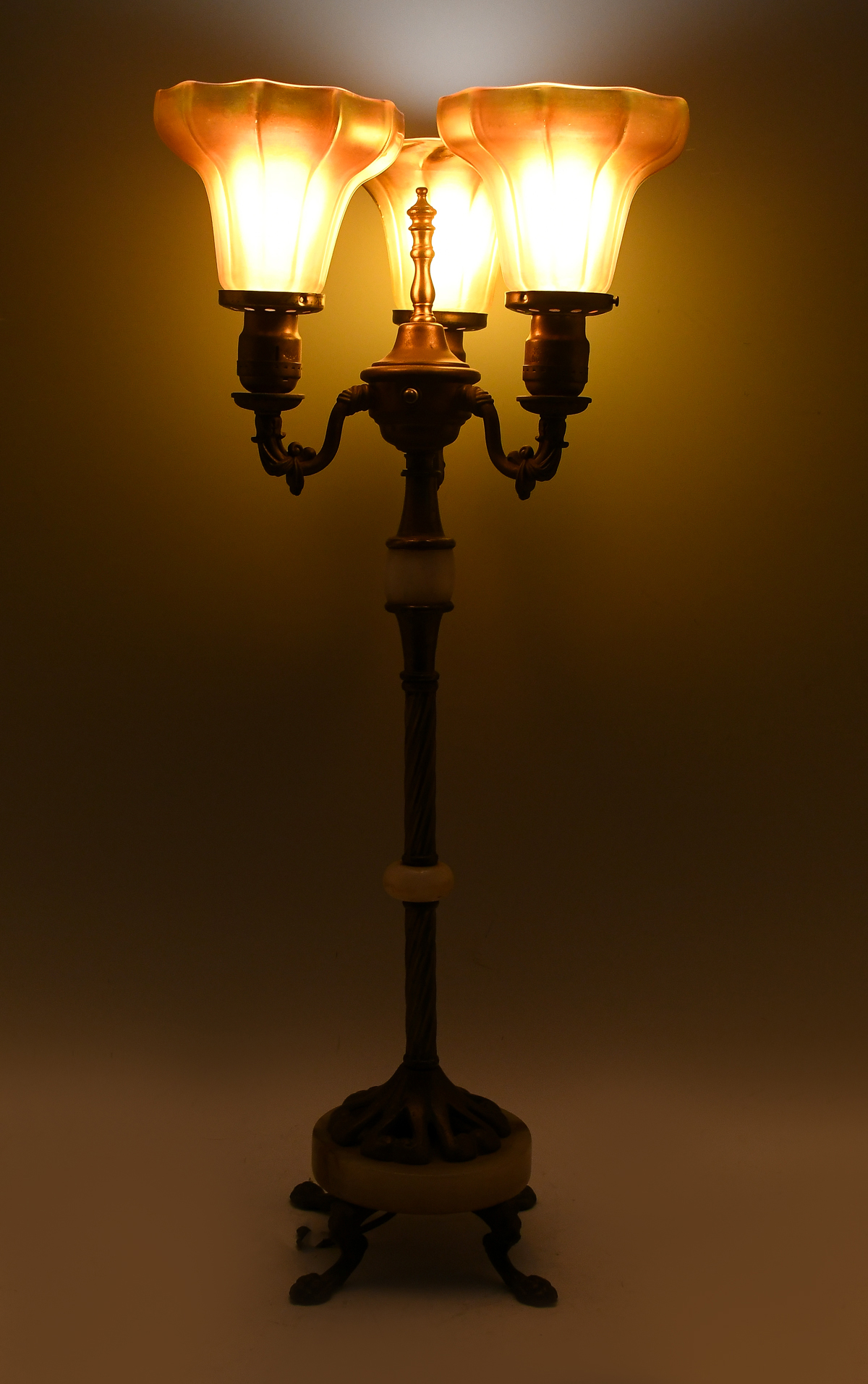 Appraisal: ART DECO LIGHT LAMP WITH ART GLASS SHADES Brass onyx