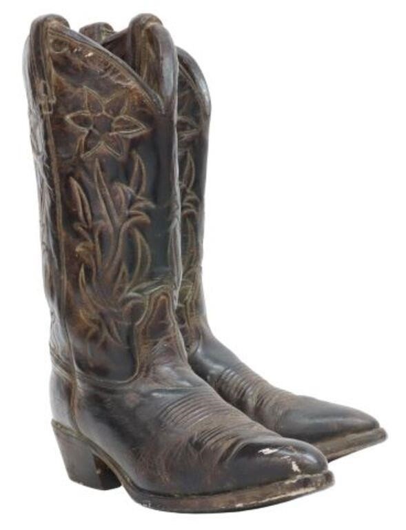 Appraisal: Western bronze plated cowboy boots sculpture in a variegated dark