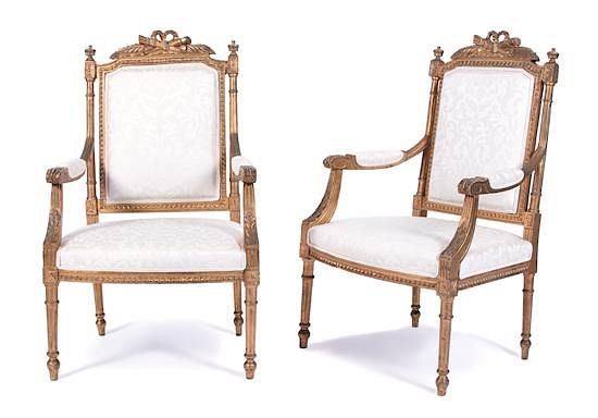 Appraisal: A Pair of Louis XVI Style Carved Giltwood Fauteuils Height