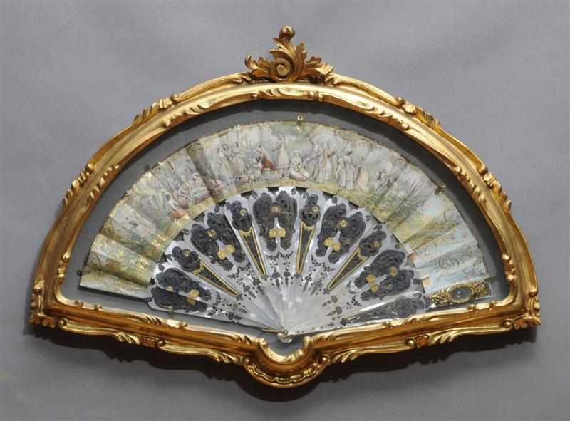 Appraisal: FRENCH LITHOGRAPHIC FAN With scene of Near Eastern potentate with