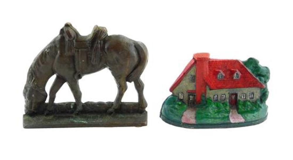 Appraisal: Two cast iron doorstops grazing horse and cottage details include