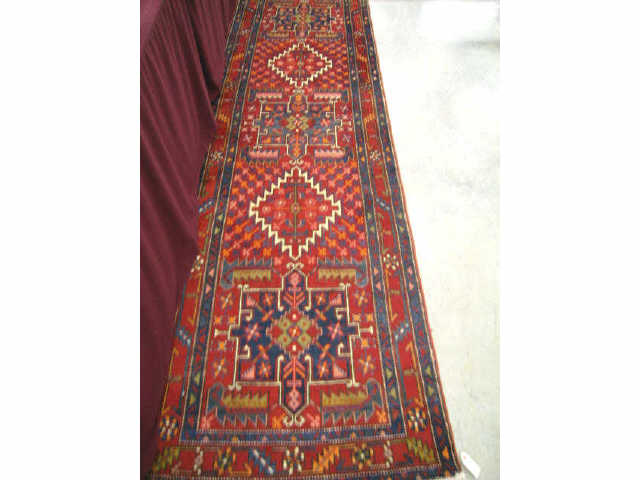 Appraisal: Heriz Persian Handmade Runner five medallions surrounded with geometric designs