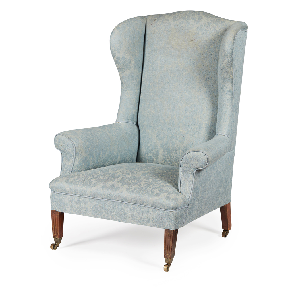 Appraisal: GEORGIAN STYLE WING ARMCHAIR EARLY TH CENTURY the high back