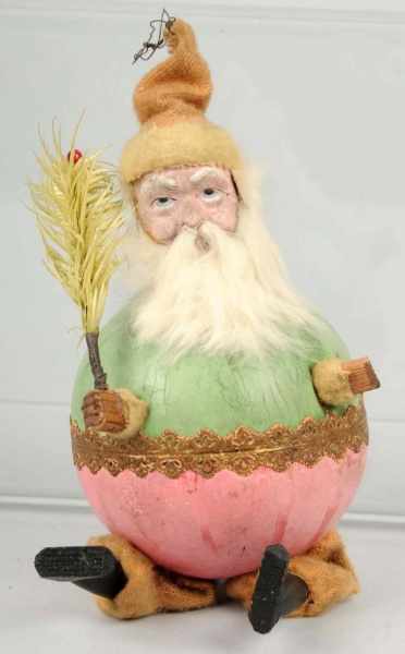 Appraisal: Rare Dresden Santa Squeaker Description Round Dresden body with green