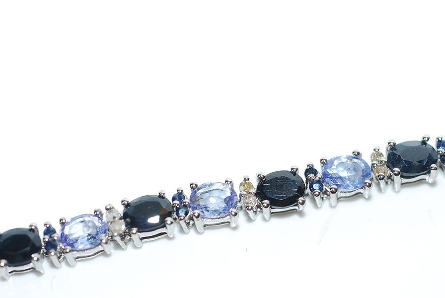 Appraisal: A TANZANTIE SAPPHIRE AND DIAMOND BRACELET IN STERLING SILVER A